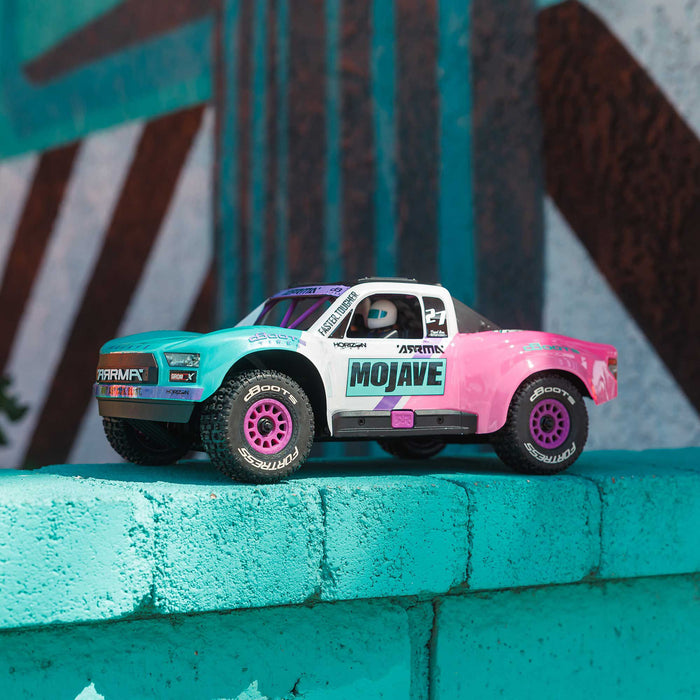 ARRMA ARA2304ST1 MOJAVE GROM BLX 223S Brushless 4X4 Small Scale Desert Truck RTR Battery & Charger Teal Pink